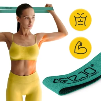 Woman stretching a green Fabric Looped Exercise Band overhead during an upper body workout, highlighting resistance and mobility use.
