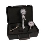 Open box displaying the full hydraulic 3-piece hand evaluation set with components securely placed