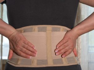 A back posture support brace designed to correct posture, offering support for the back and shoulders. Ideal for men, this adjustable belt promotes better posture and reduces strain.