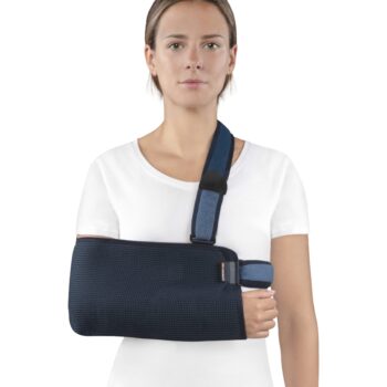 Front view of a woman wearing a Shoulder and Arm Immobiliser Sling for arm and shoulder stability.