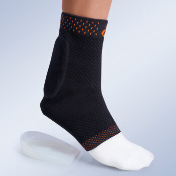 Side angle showing Elastic Ankle Brace with Achilles Tendon Pad worn on foot, demonstrating fit and support