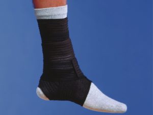 High ankle sprain brace offering support and stability for recovery from inversion sprains and running injuries