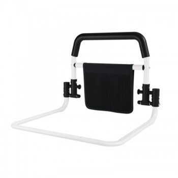 Bedside rail in use providing stable support for standing up and changing position in bed safely