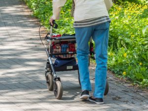 Knee rollator walker and transport chair, designed for mobility assistance with comfortable knee support and easy transport features