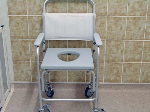 HSE provided commode chair.