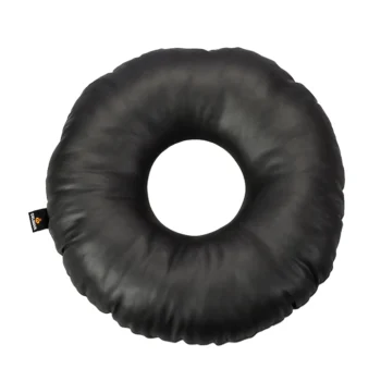 Black circular donut-shaped cushion with a hole in the center, shown on a white background