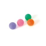 A selection of Sissel Press-Balls displayed in different colours, each representing a unique resistance level — pink (soft), blue (medium), green (strong), and orange (extra strong).