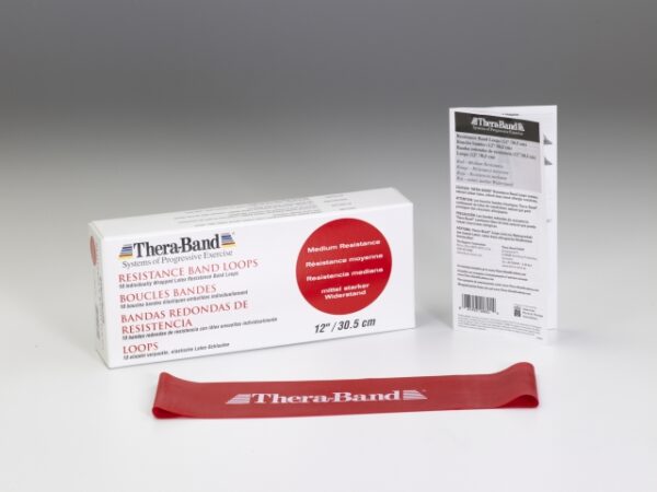 Red Thera-Band looped exercise band featuring medium resistance level alongside original packaging.