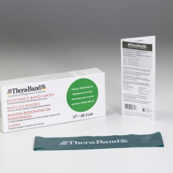 Green Thera-Band looped exercise band showing strong resistance level with packaging visible.