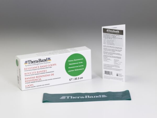 Green Thera-Band looped exercise band showing strong resistance level with packaging visible.