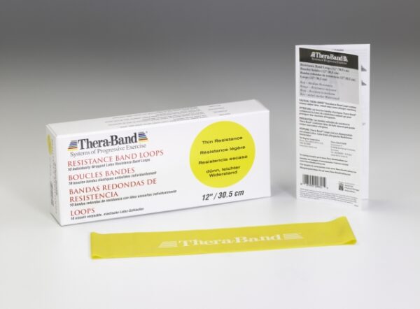 Yellow Thera-Band looped exercise band displaying light resistance level next to its packaging.
