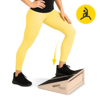 wooden slant board rear view in home gym setting for stretching and rehabilitation use