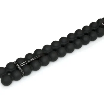 Black Sissel Spinefitter massage tool with rounded pressure nodes.