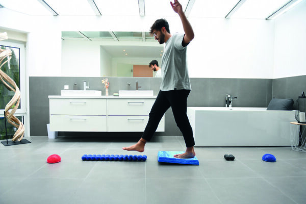 Man stepping across the Sissel Spinefitter surface to challenge balance and coordination