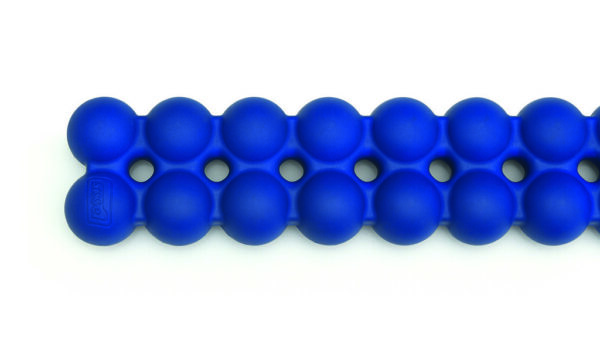 Close-up of the Sissel Spinefitter, highlighting the dual roller balls and textured surface