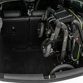Folded electric wheelchair in car boot – perfect for travel and transport in Ireland.