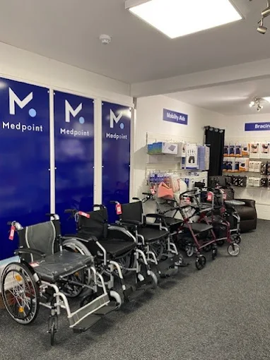 Part of Medpoint's showroom with 6 manual and electric wheelchair models on display.