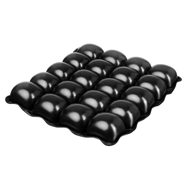 Close-up of the uncovered BUBBLE EXCLUSIVE Anti-bedsore Cushion showing individual black air cells for pressure redistribution