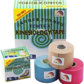 A set of three rolls of Temtex kinesiology tape in beige, blue, and pink, displayed alongside the green and white striped packaging box.