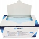 Open box of disposable face masks showing neatly stacked masks with visible ear loops, ideal for healthcare or personal use.