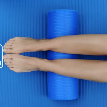 Woman using the Sissel Massage Foam Roller to massage and relax her calf muscles.