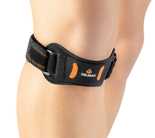 Close-up of a person wearing the Patellar Knee Support Band on their knee, showing comfortable fit and support during activity.