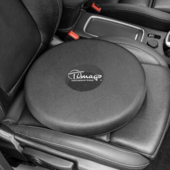 Padded swivel cushion placed on a car seat for easy rotation and comfort